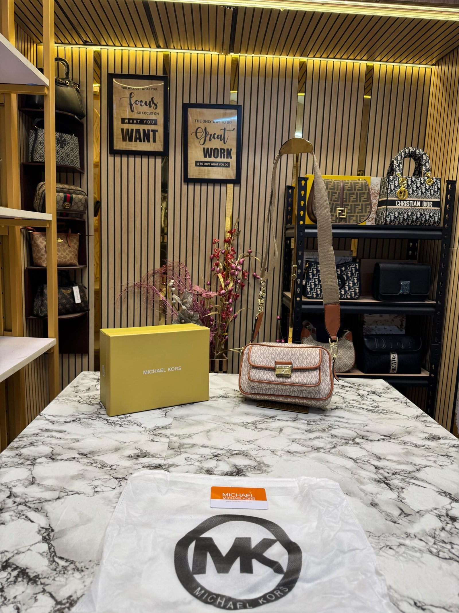 MICHAEL KORS SLING BAG